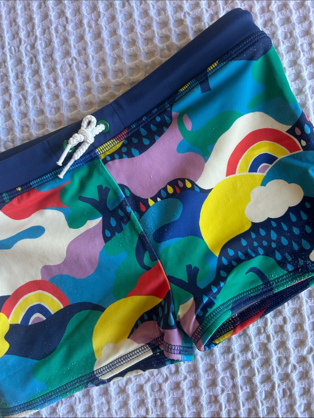 Mini Boden Multicolor Rainbow Print Euro-Style Swim Trunks - Navy Waistband